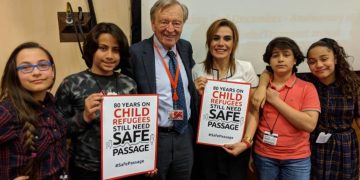 Lord Alf Dubs pictured with campaigners from the charity SafePassage