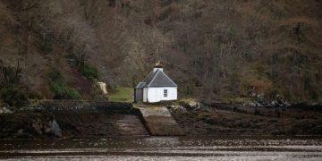cottage on the bank of a loch