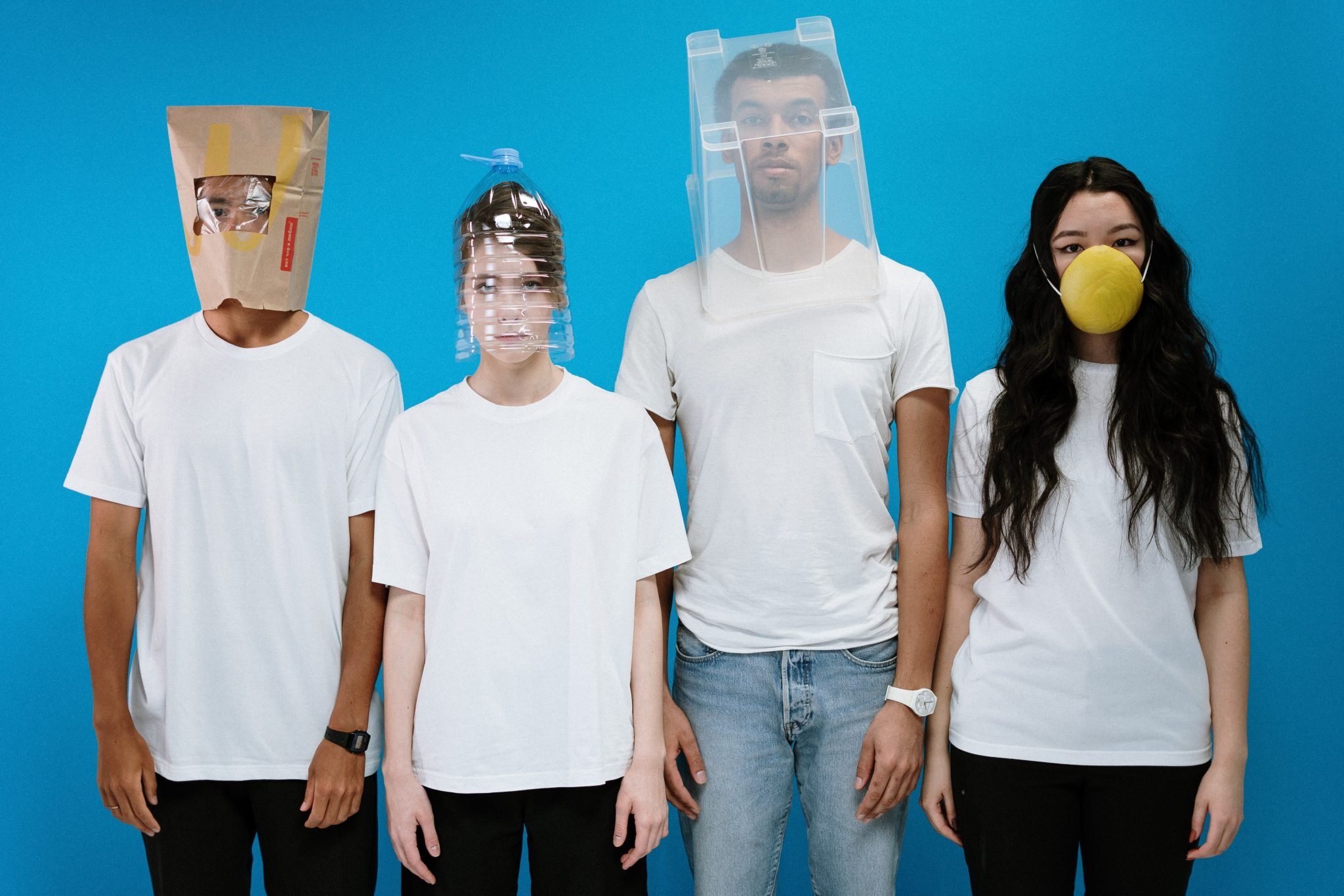 people wearing make-shift masks