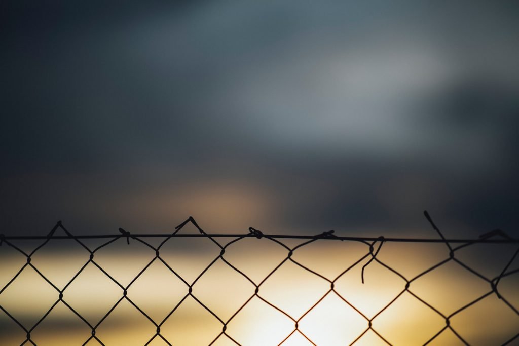 Abstract photo of a fence with out of focus background.
