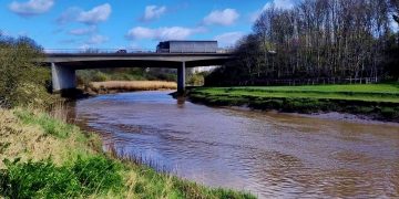 River flowing under a roadbridge