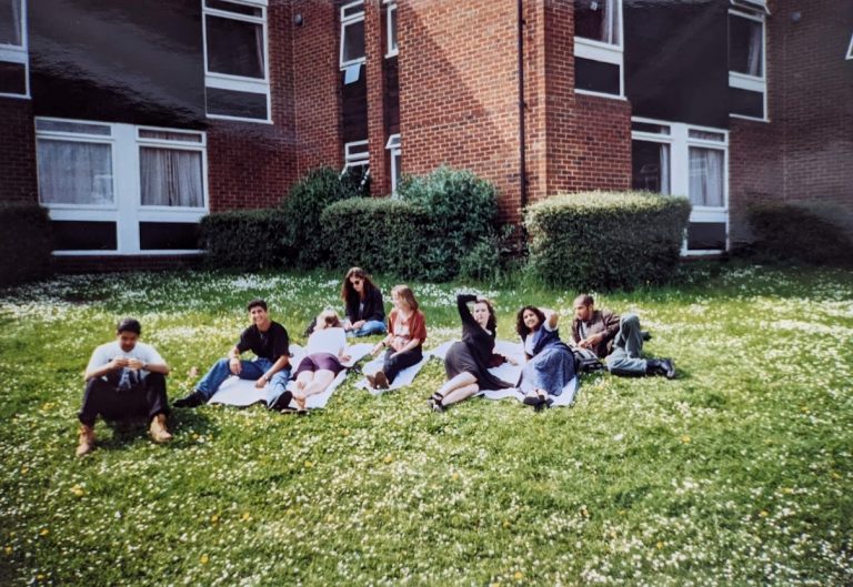 A group of Sussex students sat on the grass during Summer 1994
