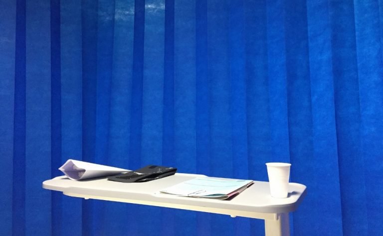 Behind the curtain preparing for a biopsy.