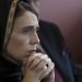 Jacinda Ardern looking throughtful wearing a headscarf
