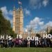 People outside Westminster holding up the words This is our home