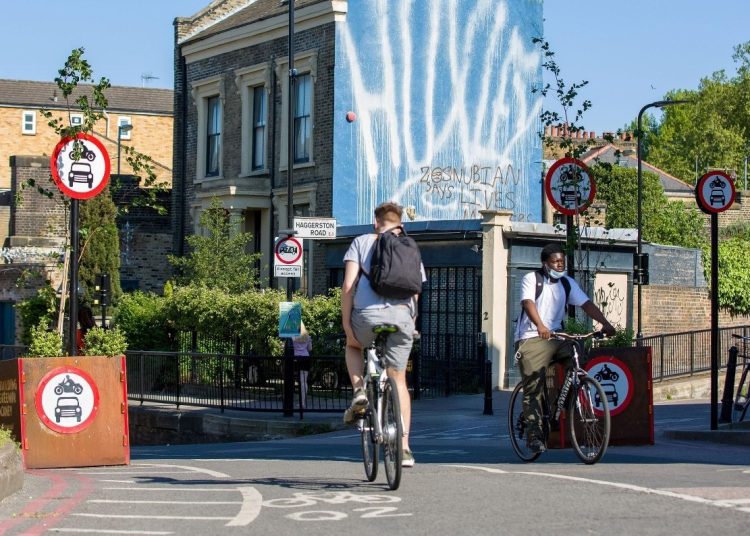 Cyclist entering a Low Traffic Neighbourhood in Hackney, which is planning to expand its traffic-free zones.