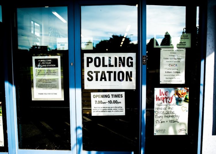 Polling station sign door