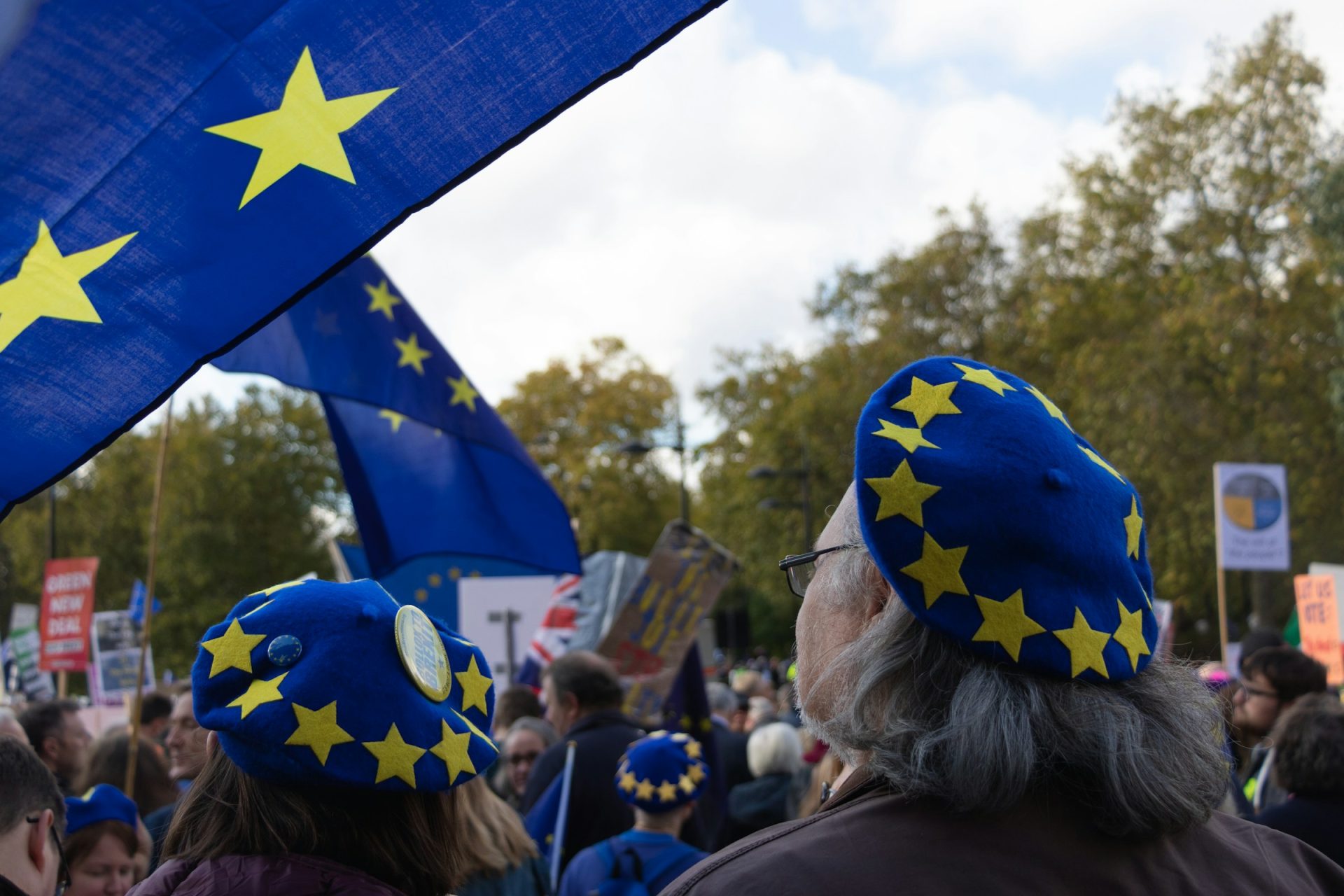 Berets for Brexit at an anti-Brexit march. Photo by Jannes Van den wouwer on Unsplash.