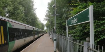 Uckfield station with a train in the station.