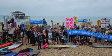 Group of protesters on Brighton beach