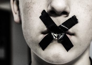 A taped up mouth