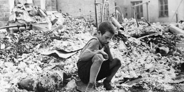 A boy grieves after being made homeless during the German bombing of Warsaw, Poland.