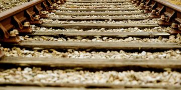 Railway track. Photo by Nick Fewings on Unsplash