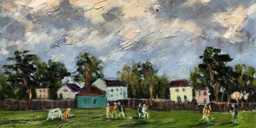Playing football on the village green