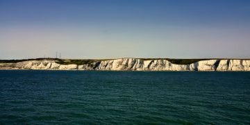 white cliffs at the edge of the sea