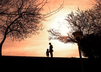 Silhouette of mother and child
