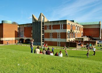 Falmer House with students - University of Sussex