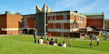 Falmer House with students - University of Sussex