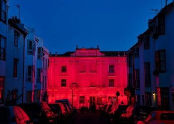 Photo of the Old Market taken at night illuminated with red lights