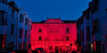 Photo of the Old Market taken at night illuminated with red lights