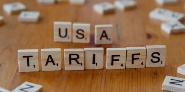 Scrabble letters spelling USA Tariffs
