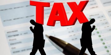 Graphic with the word Tax in big red letters
