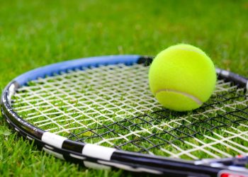 Tennis ball and racket