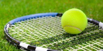 Tennis ball and racket