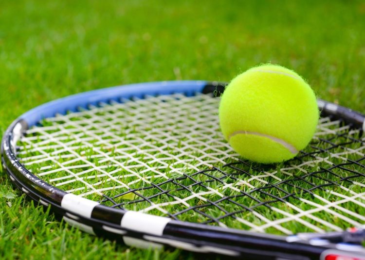Tennis ball and racket