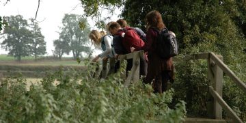 Friends stopping at Pooh Bridge