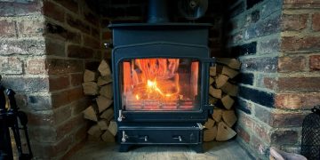 A log burner in a fireplace