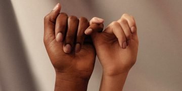 hands with little fingers linked