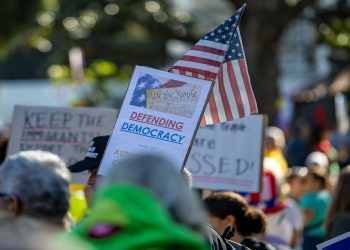 Americans campaigning against Trump