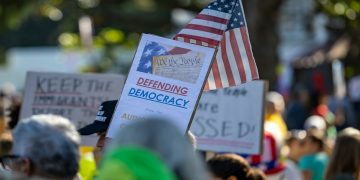 Americans campaigning against Trump