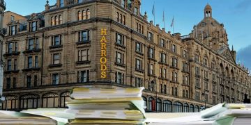 Harrods with piles of paper superimposed on it