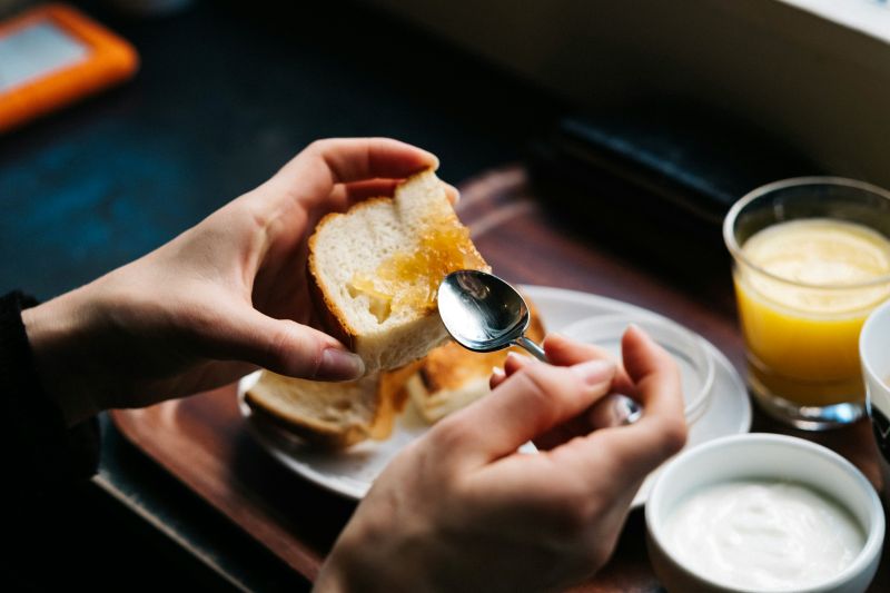Lady eating toast