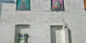 Building with artwork by Unify