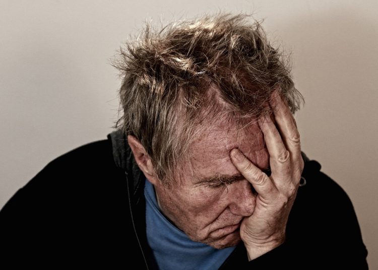 man looking exhausted