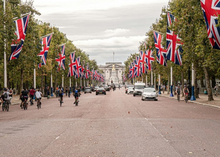 The Mall in London full of people and flags