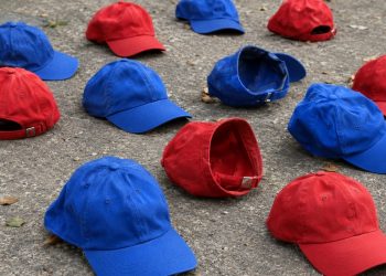 red and blue caps on the ground