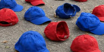 red and blue caps on the ground