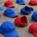 red and blue caps on the ground