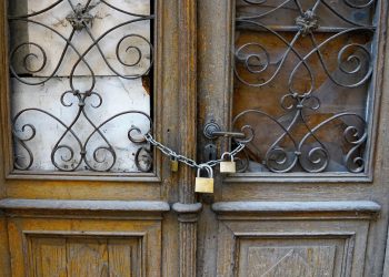 Old door with three locks