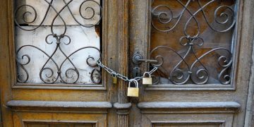 Old door with three locks