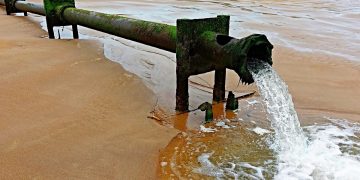 waist pipe on a beach